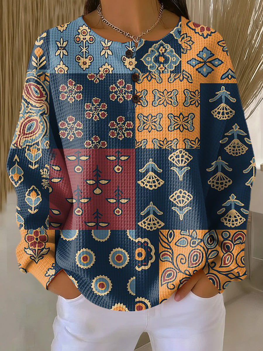 Anika | Tröja med etnisk rutigt blommönster